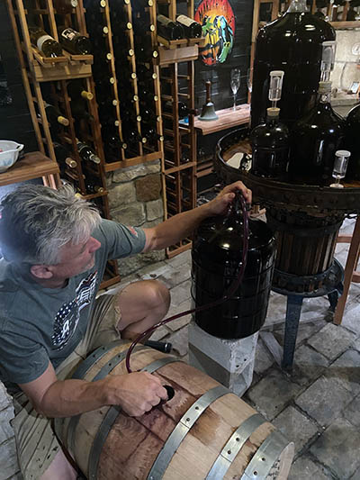 Alex Striler making wine